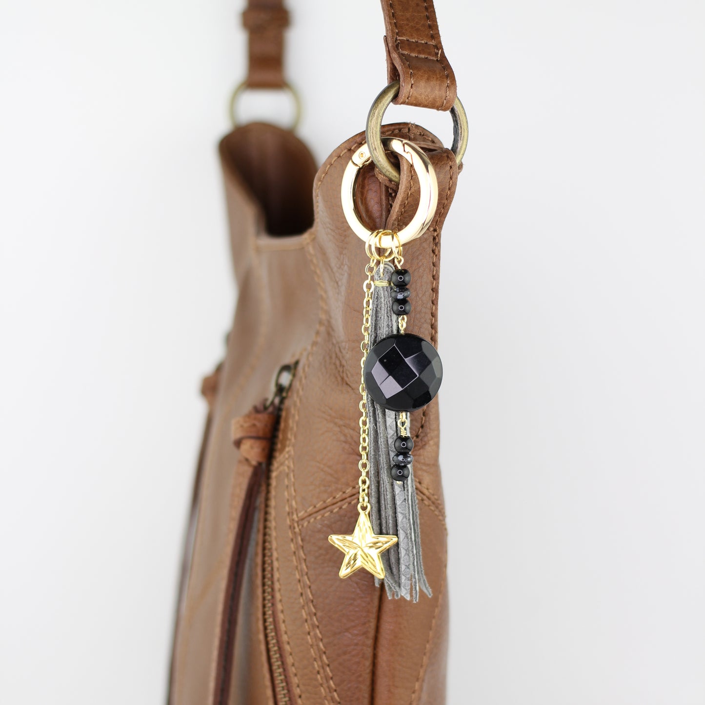 Black Onyx, Star Charm, and Gray Leather Tassel Bag Charm