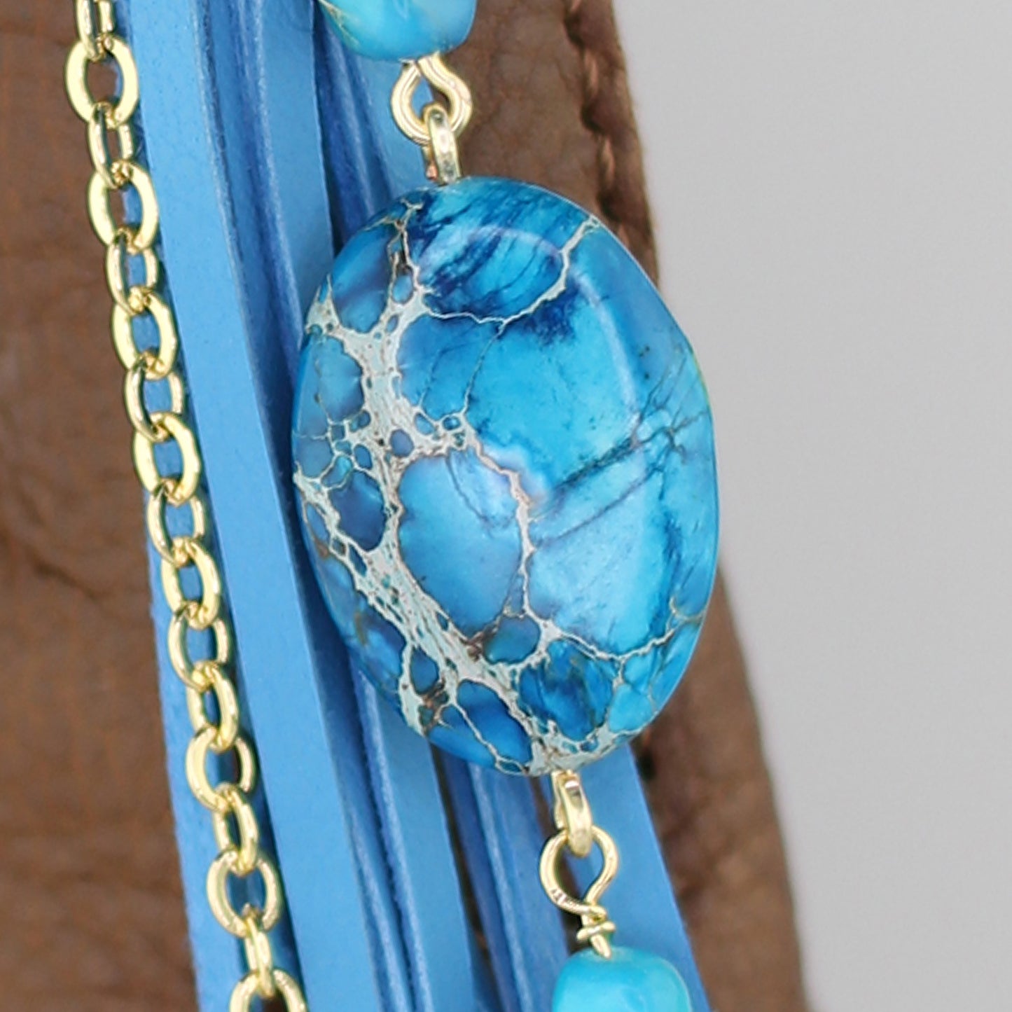 Blue Impression Jasper, Evil Eye Charm, and Turquoise Blue Leather Tassel Bag Charm