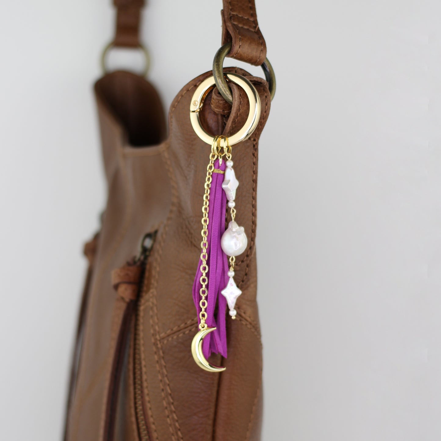 Freshwater Pearl, Moon Charm, and Fuchsia Leather Tassel Bag Charm