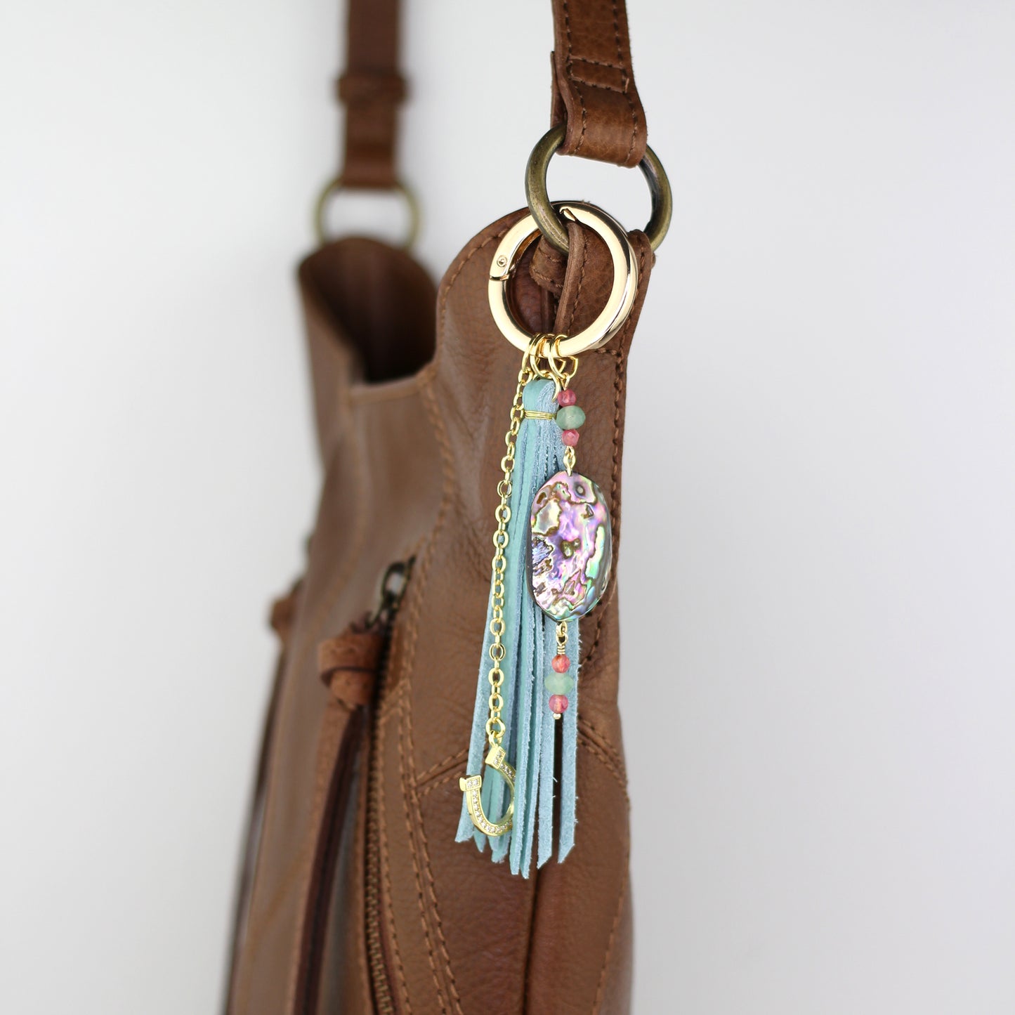 Abalone Shell, Horseshoe Charm and Blue Leather Tassel Bag Charm