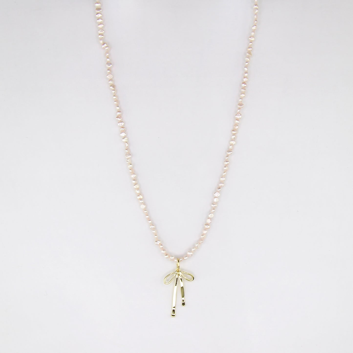 Fresh Water Pearl Necklace with Bow Charm