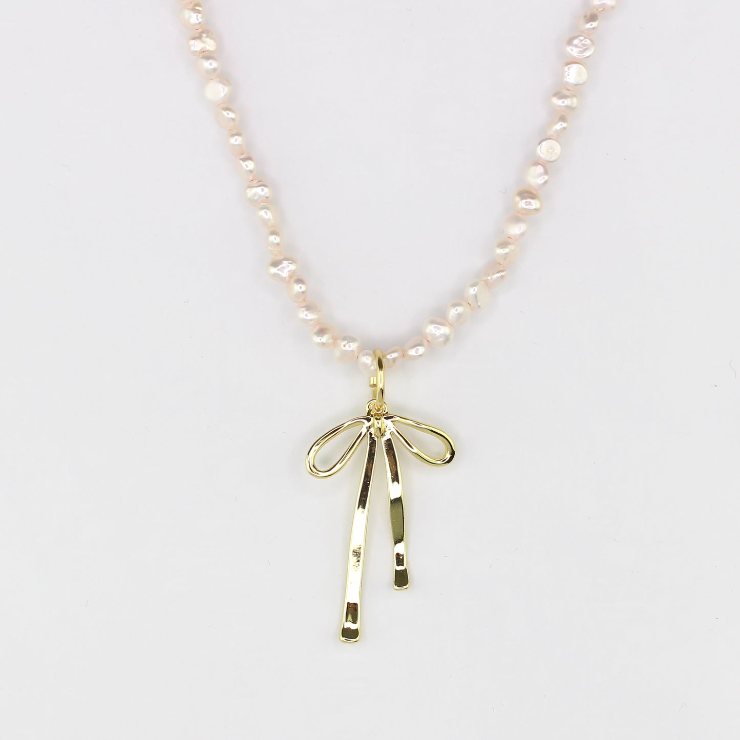 Fresh Water Pearl Necklace with Bow Charm